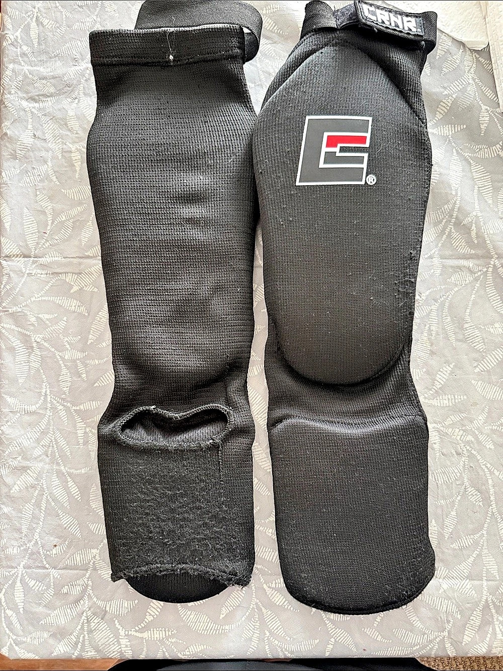 Combat Corner Slip On Elastic Shin Pads Black